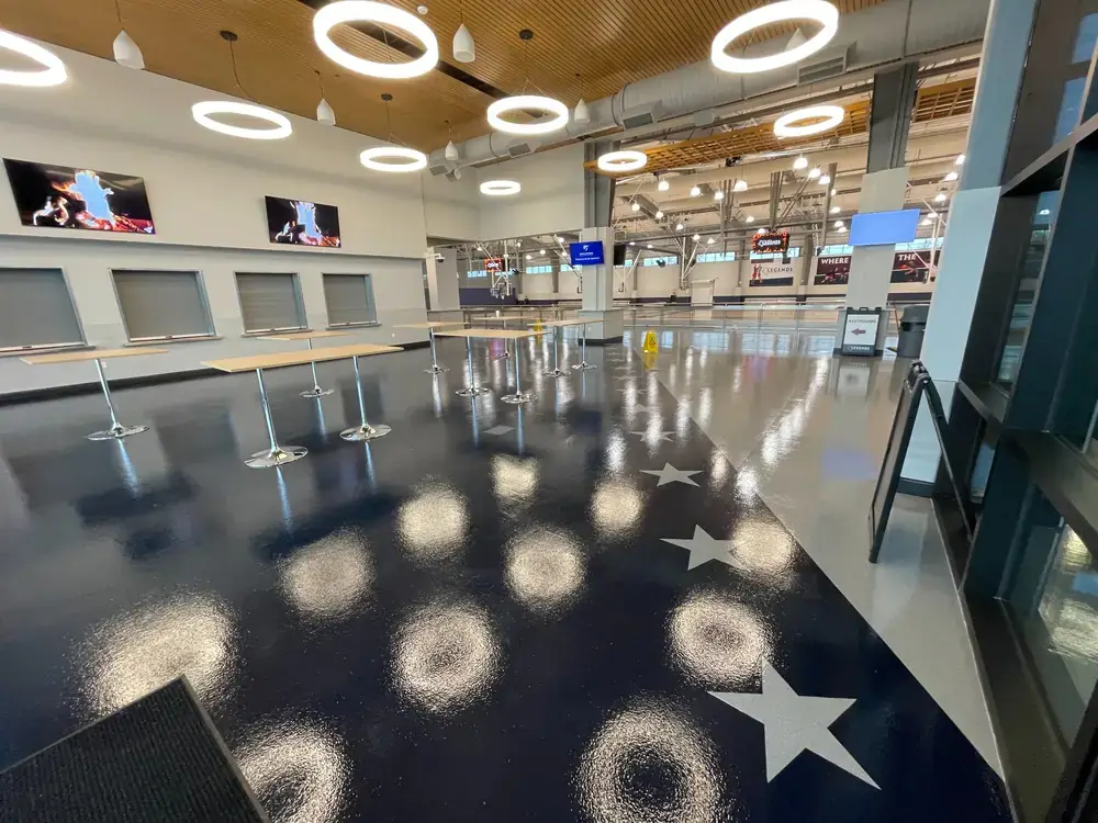 Resinous flooring in sports facility